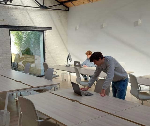 Coworkers working in the open space